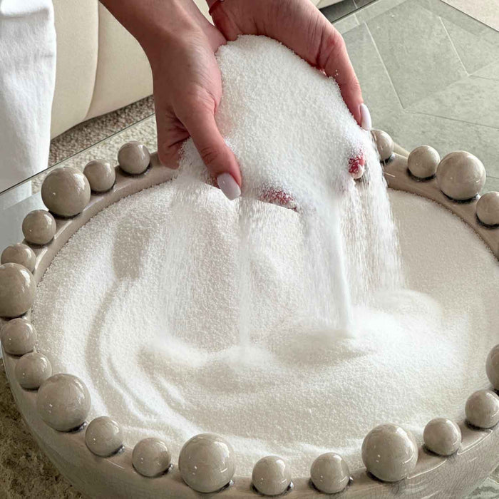 Pour Candle Sand into a container